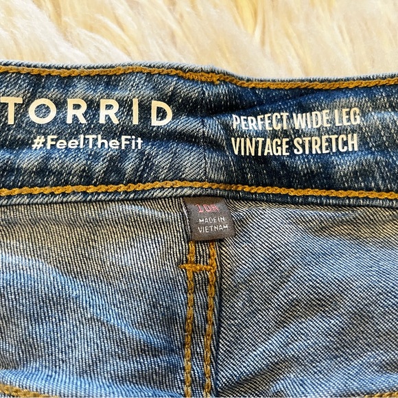 Torrid Blue Flare Jeans with Distressed Details - Picture 8 of 11